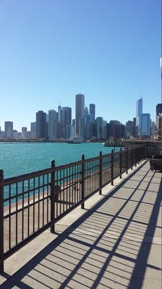 there is a view of the city from across the water and on the bridge over looking the ocean