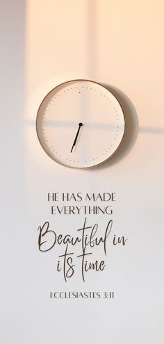 a clock with the words he has made everything beautiful in its time