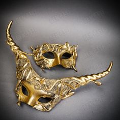 This luxurious gold masquerade mask set features a striking horned mask with intricate snake designs and a smaller, matching serpent mask. Both masks are crafted with a textured gold finish, offering a regal and elegant look for masquerades, Halloween, or themed events. Perfect for couples, these masks add a bold and mysterious flair to any occasion, making them an ideal choice for dramatic, coordinated costumes. Both masks are made of plastic base, and decorated with Artificial Moss and mini rubber snakes. Then painted in a Shiny Metallic Textured Gold color. Color: Gold This listing is for a set of gold masks (two masks included). If you only need one of the masks or other colors, please contact me for details.  Please also check out my Etsy store for other colors available. Custom color Moss Costume, Halloween Medusa, Women Demon, Horned Mask, Nye 2024, Gold Masquerade Mask, Gold Halloween, Masquerade Theme, Halloween Party Costume