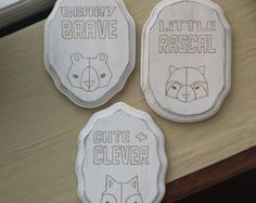 three little beaver coasters are sitting on a table top with the words cut and clever