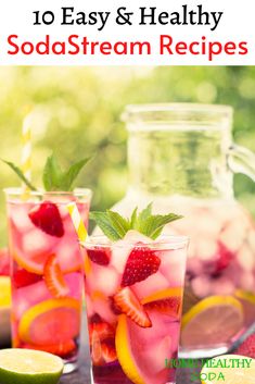 two glasses filled with fruit and ice on top of a table next to lemons