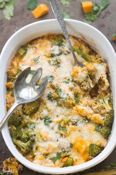 a casserole dish with broccoli, cheese and other vegetables in it