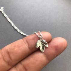 Leaf Necklace  + Sterling silver chain with round spring clasp + Sterling silver leaf charm + Leaf charm measures 13mm + Item will be gift wrapped and will come complete with gift box I have many charm necklaces listed and I would like to think that there is something for everyone so please take a look to see what I have in my collection here: https://www.etsy.com/uk/shop/Instyleglamour?ref=hdr_shop_menu&search_query=charm HERE IS THE 10% OFF COUPON LINK BELOW:- http://eepurl.com/g_Jkif Serotonin Necklace, Leaf Necklace Silver, Maple Leaf Necklace, Giraffe Jewelry, Chemistry Gifts, Silver Leaf Bracelet, Africa Necklace, Molecule Necklace, Letter Jewelry