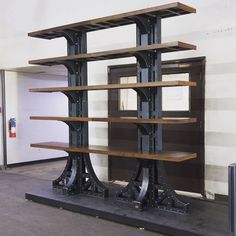 the bookshelf is made out of metal and wood