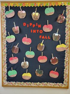 an apple themed bulletin board with the words dippin into fall