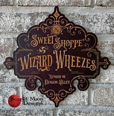 a sign that is on the side of a brick wall saying, sweet shop wizard wheezes