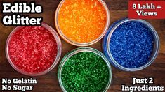 four bowls filled with different colored glitters on top of a wooden table