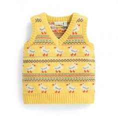 a sweater with sheeps on it is shown in yellow and has an argyle pattern