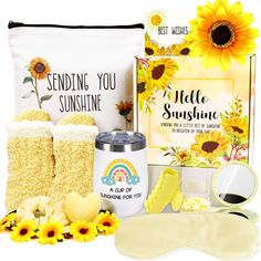 the sunflowers are next to some towels and other items in front of it