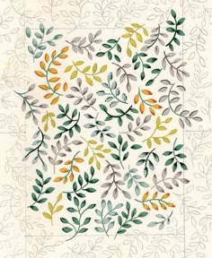 a square quilt with leaves on it