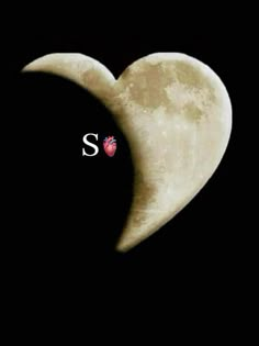 a heart shaped moon with the word s on it