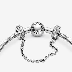 You've collected the charms that celebrate your memories and mark your milestones, now keep them safe on your Pandora Moments bracelet with this sterling silver safety chain charm. Accented with cubic zirconia for a sparkling finish, it's decorative in its own right and fitted with a swivel chain for tangle-free styling. Pandora Safety Chain, Pandora Moments Bracelet, Pandora Inspiration, Bracelet Pandora, Stamped Bracelet, Safety Chain, Dangle Charms, Pandora Bracelet, Sterling Silver Charm