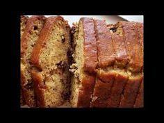 sliced banana bread sitting on top of a white plate