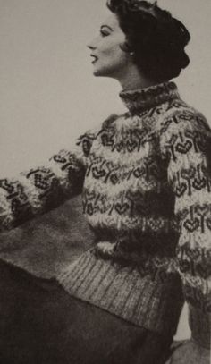 black and white photograph of a woman wearing a sweater