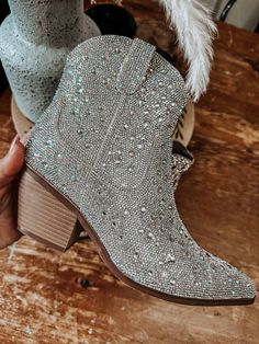 These Rhinestone Saints & Rebels Cowgirl Boots are sure to be a hit whatever you pair 'em with! From jeans to dresses and shorts to skirts, they are encrusted with a variety of sized rhinestones to add a bit of glam to your country roots. Plus, they have a 2.5" heel will keep you struttin' around with a little extra sass! Fit's as expected. Rhinestone Cowgirl Boots, Carrie Underwood Concert, Cowgirl Rhinestone, Rhinestone Cowboy Boots, Rhinestone Boots, Rhinestone Cowboy, Boots Steve Madden, Rhinestone Cowgirl, Cowgirl Wedding