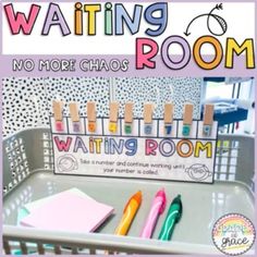 the waiting room sign has pens and markers on it