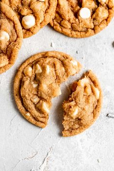 several cookies with white chocolate chips on top