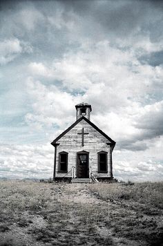 an old abandoned church in the middle of nowhere