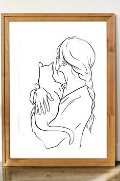 a black and white drawing of a woman holding a cat