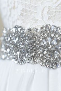 The dazzling crystals in sophisticated design adorned with fine pearls makes this Best Sophisticated Crystals Pearls Bridal Sash For Sale beautifully ornate. It is a great choice for wedding gown. content satin, rhinestones, pearls, alloy embellished portion length 44cm, width 5cm ribbon length 275cm, width 4cm Luxury Crystal Embellished Bridal Belt, Luxury Beaded Silver Bridal Belt, Luxury Silver Beaded Bridal Belt, Embellished Crystal Bridal Belt In Silver, Adjustable Silver Crystal Bridal Belt, The Dazzling, Bridal Sash, Sophisticated Design, Bridal Pearls