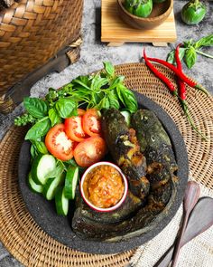 an assortment of vegetables and sauce on a plate