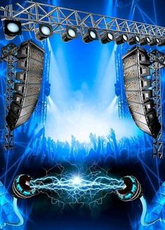 an image of stage lighting and sound equipment for a concert or show with blue lights