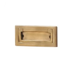 a brass door handle on a white background