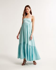 Flattering longer-length maxi dress in our stretchy taffeta fabric with a shiny finish and babydoll silhouette, featuring adjustable straps, bow-back detail and a drama tiered skirt. Styles For Summer, Rehearsal Dinner Dress, Dinner Dresses, Rehearsal Dinner Outfits, Satin Halter Dress, Bold Dresses, Tropical Print Dress, Rehearsal Dinner Dresses, Taffeta Fabric