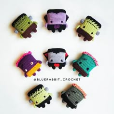 six small crocheted toy animals are arranged in the shape of an animal with different colors