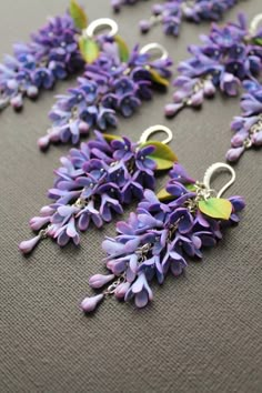 Several pairs of these lovely lavender earrings were delivered to their owners at the same time today.  I'll let you in on a secret: Each pair has a five-petal flower - for happiness and good luck!     Find a lilac flower with 5 petals:   Attitudes towards the miraculously changing reality of one's own life are created;   Eliminate doubts about fulfilling desires;   The habitual tension of thought dissipates somewhere;   Stress, resentment, anger go away.   There is also another pair of earrings Purple Flower-shaped Sterling Silver Earrings, Purple Flower Sterling Silver Earrings, Purple Flower-shaped Whimsical Jewelry, Whimsical Purple Flower Jewelry, Lavender Flower Jewelry With Matching Earrings, Purple Flower Earrings, Whimsical Purple Flower-shaped Jewelry, Lavender Flower Jewelry Set With Matching Earrings, Lavender Flower Drop Earrings Gift