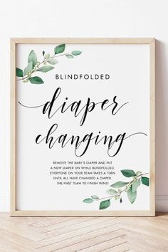 a framed print with the words diaper changing in black and white, surrounded by greenery