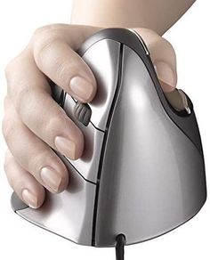 a person is holding onto a computer mouse