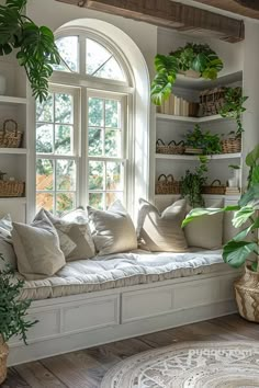 a living room filled with lots of furniture and plants on top of windowsills