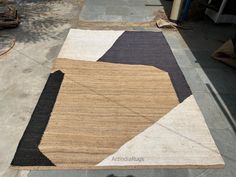 an area rug is laying on the ground