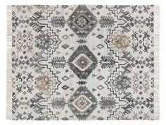 an old rug with many different colors and patterns on the carpet, including greys, browns