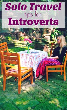 a woman sitting at a table in the middle of a garden with text overlay that reads solo travel tips for innovers