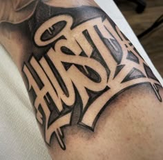 a person with a tattoo on their arm