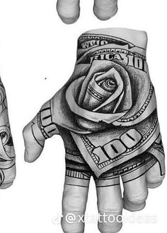 two hands with tattoos and money on them