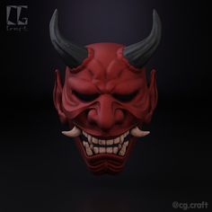 a red mask with horns and fangs on it