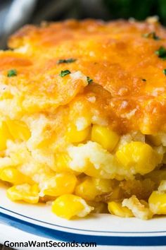 a close up of a plate of food with broccoli and corn on it