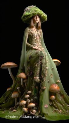 a woman in a green dress and hat with mushrooms