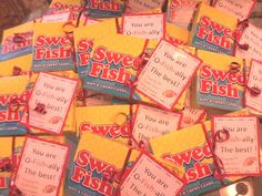 several candy bars are stacked on top of each other with the words sweet fish written on them