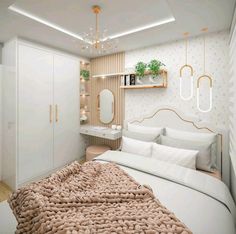 a bedroom with white walls and gold accents