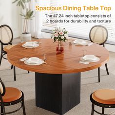 a round dining table with four chairs around it and the text spaceous dining table top