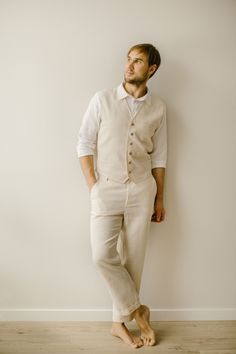 "Our linen rustic wedding suit is handmade to fit your unique measurements. We're proud that there are no factory involved in crafting our linen clothes for men. Each rustic wedding suit is carefully made with a focus on every little detail. DETAILS Color in the picture: ivory and snow white. Other colors are available. The model in the picture is 186 cm (6'1\") tall and is wearing size L. SIZING After you place your order, I will email you to request your measurements, ensuring a perfect fit fo Fitted Pants With Pockets For Wedding, Tailored Wedding Pants With Pockets, Tailored Sleeveless Suit For Wedding, Tailored Sleeveless Wedding Suits, Tailored Sleeveless Three-piece Suit For Wedding, Classic Sleeveless Three-piece Suit For Wedding, Beige Linen Suit For Wedding, Fitted Wedding Vest, Tailored Linen Suit For Wedding