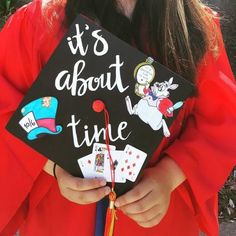 a girl wearing a graduation cap that says it's about time