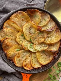 baked potato wedges in a cast iron skillet