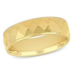 a yellow gold wedding ring with pyramids on the inside and outside, set against a white background