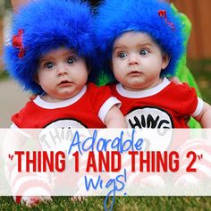 two babies with blue hair sitting on the grass wearing red and white outfits that read, best twin costume ever