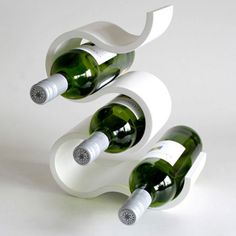 three bottles of wine are stacked on top of each other